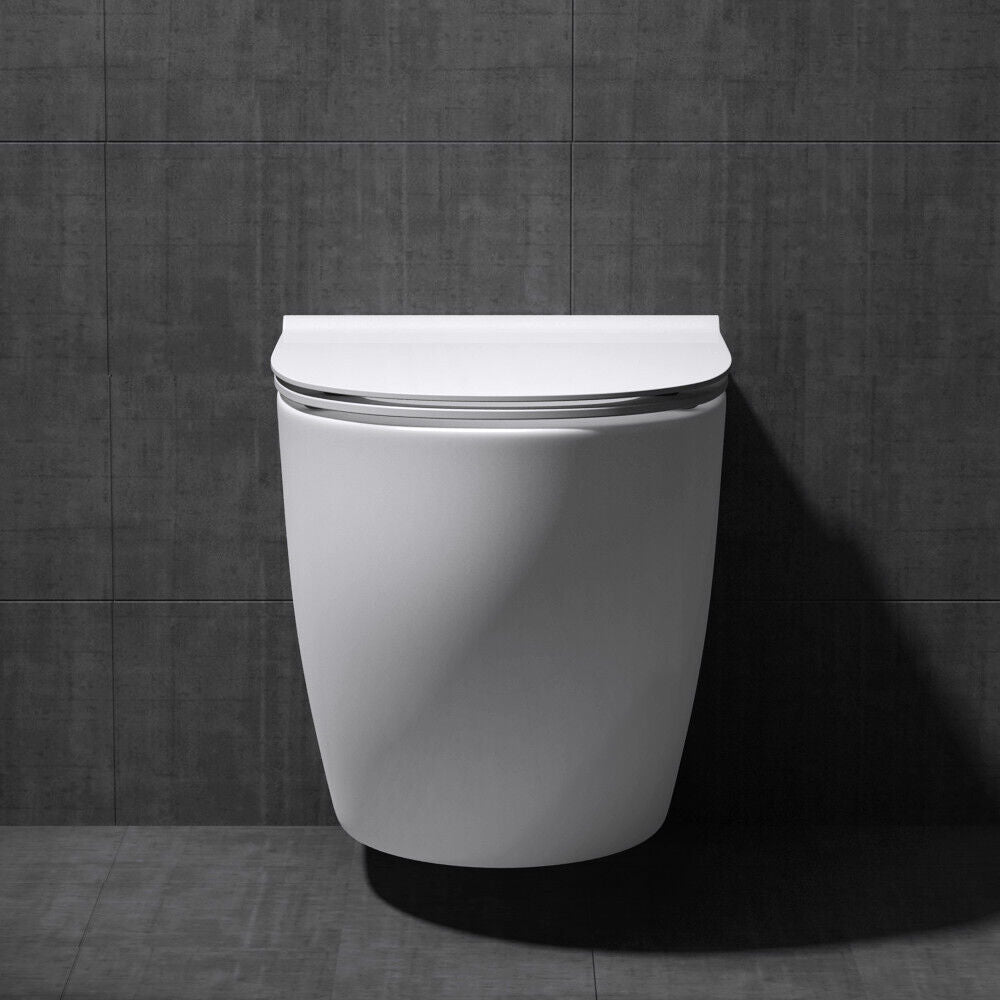Bathroom Toilet Pan Ceramic Wall Hung Round WC White + Soft Close Seat 555mm